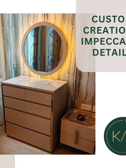 A custom-designed dresser with a marble top and metallic trim, paired with a matching nightstand. The backlit circular mirror completes this elegant and functional bedroom storage set.