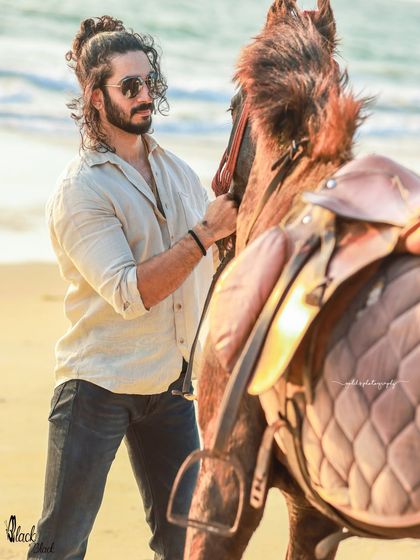 An extensive editorial series of a male model with a horse on the beach. I used a mix of color and black and white, along with varied poses, to create a powerful narrative of untamed strength and freedom.