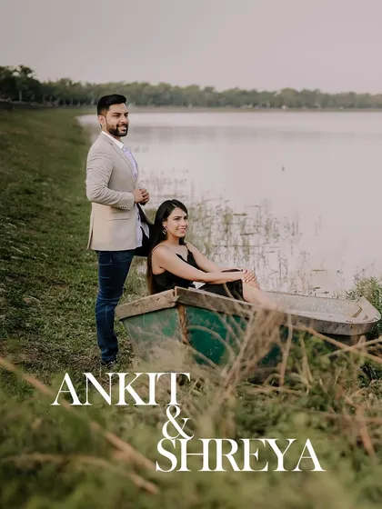 A beautifully composed portrait from a lakeside pre-wedding shoot. The couple's names overlaid on the image add a personalized touch, perfect for a 'save the date' card.