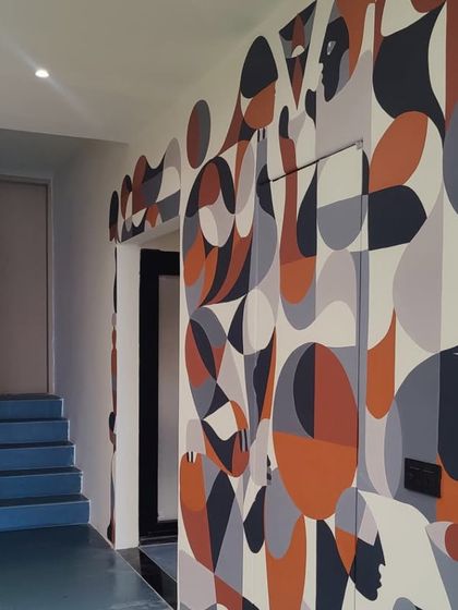 Another view of the mural flowing around the corridor.