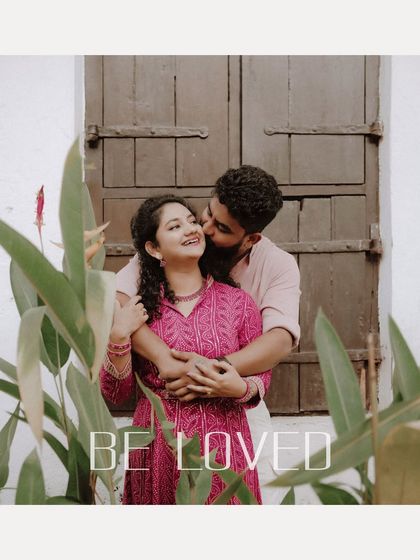 A romantic portrait of the groom kissing his bride's cheek, with the word "Beloved" celebrating their affection.