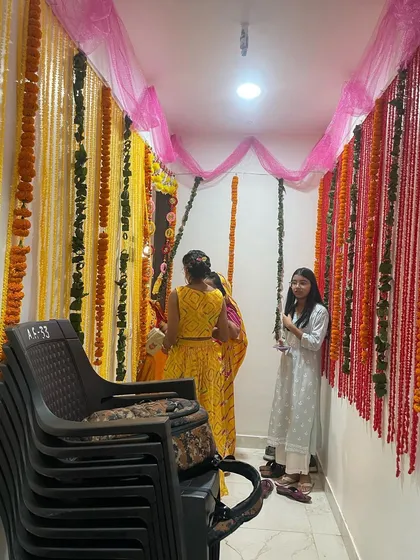Simple and beautiful flower decoration for a Griha Pravesh ceremony. I use fresh marigold garlands and colorful chunni to create a traditional and auspicious welcome for your new home.