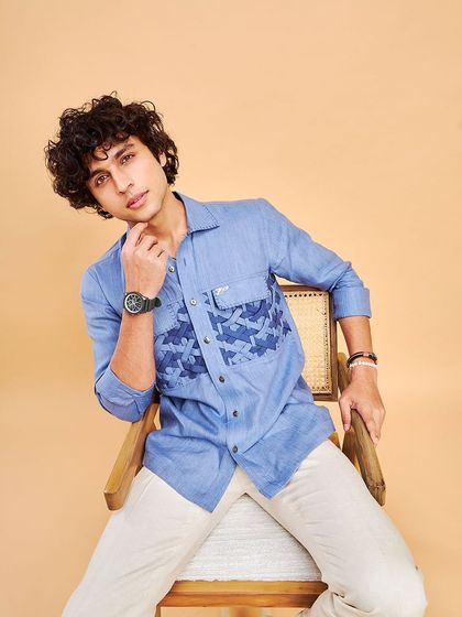 Another look at the Bunaee waffle pure linen shirt. The unique texture and comfortable fit make it a perfect choice for beating the heat in style.