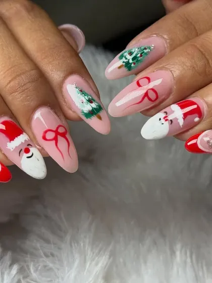 Getting into the festive spirit with this Christmas-themed nail art. This set includes hand-painted Santa hats, tiny Christmas trees, and delicate red bows, making it the perfect accessory for the holiday season.
