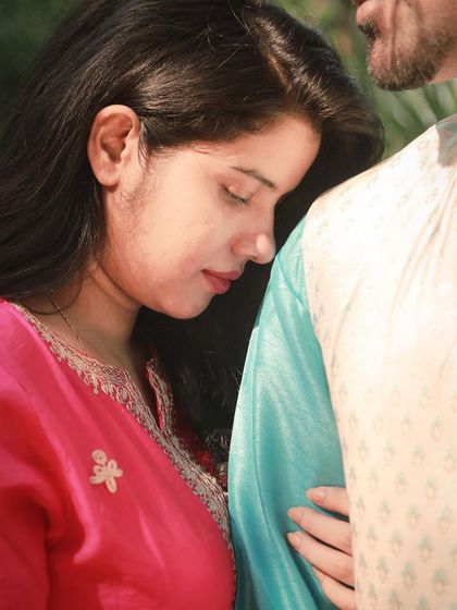 An intimate and soft-focused close-up, capturing a tender moment between the couple during their pre-wedding session.