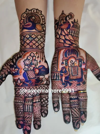 A colorful and artistic design, where I've added color to the henna to make the elephant and peacock motifs stand out.