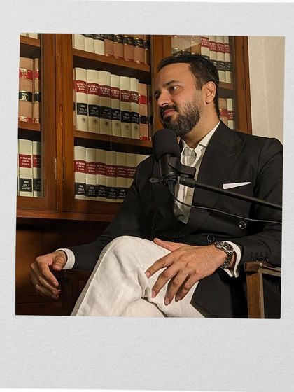 A candid shot during a podcast recording. Sharing my knowledge and experience with a wider audience is part of my commitment to legal education.