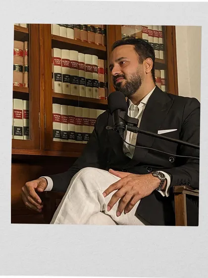 A candid shot during a podcast recording. Sharing my knowledge and experience with a wider audience is part of my commitment to legal education.