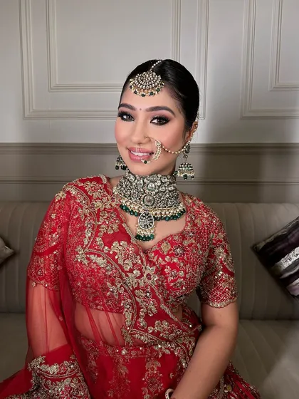 A beautiful smile from a happy bride, her jewellery adding the perfect finishing touch.