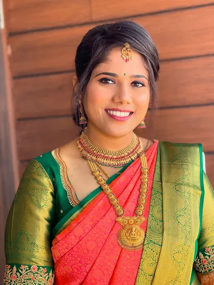 The bride looking radiant and ready to greet her guests.