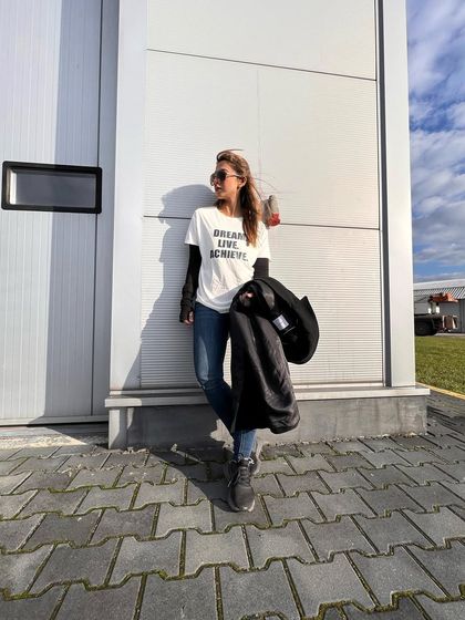 A casual moment during a work trip. My t-shirt says "Dream, Live, Achieve," which is a motto I try to live by.