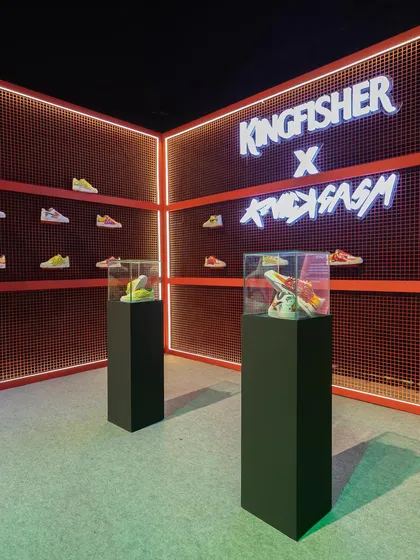This is our premium event installation for the Kingfisher x Knickgasm collaboration. We design and build high-impact displays with custom lighting and product pedestals to make your brand stand out.