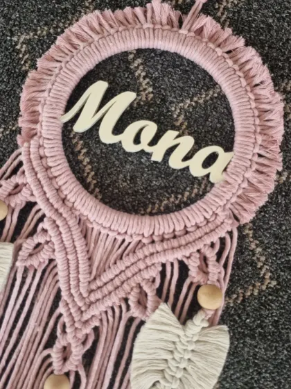 A detailed look at the 'Mona' custom nameplate. We focus on every knot and detail to ensure your personalized wall hanging is a symbol of love and personal touch.