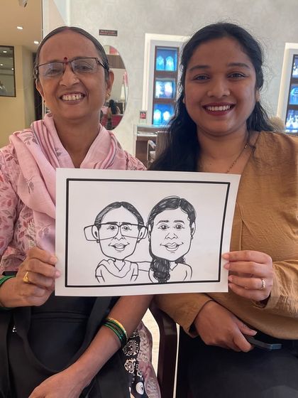 A mother-daughter caricature, capturing a special family bond in a fun, artistic way.