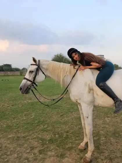 A rider leans in for a hug. The connection you can feel with a horse is truly special.