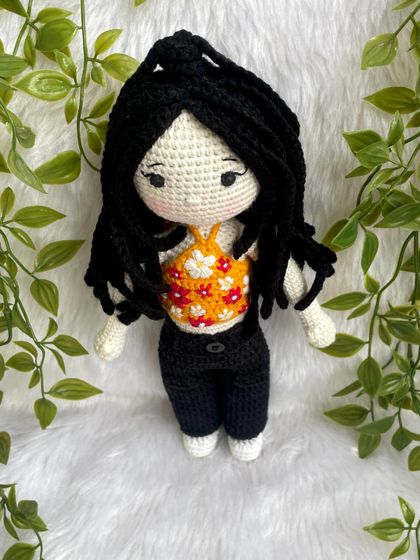 This replica doll features beautiful braided hair and a floral halter top. The customer requested no mouth for a unique, stylized look, which I think turned out so sweet and artistic.