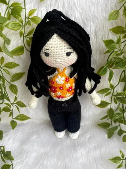 This replica doll features beautiful braided hair and a floral halter top. The customer requested no mouth for a unique, stylized look, which I think turned out so sweet and artistic.
