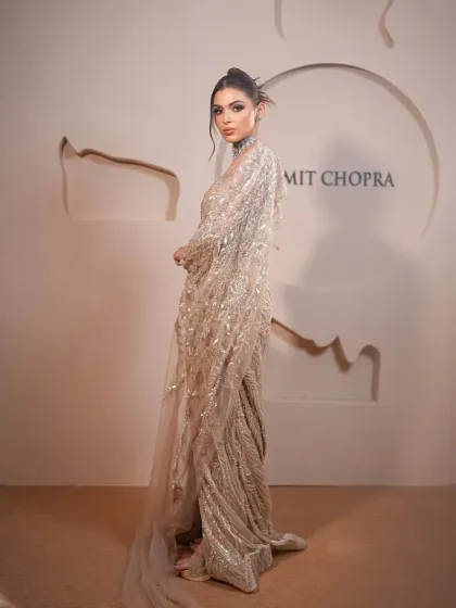 Elegance in motion. I styled this shimmering champagne gown with a delicate cape to create a look of effortless sophistication, perfect for a cocktail party or an elegant evening gala.