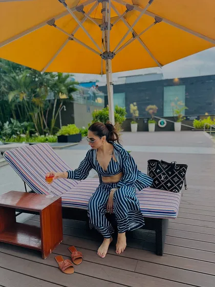 Golden hour by the pool. This striped co-ord set is the perfect resort wear for a relaxing staycation.
