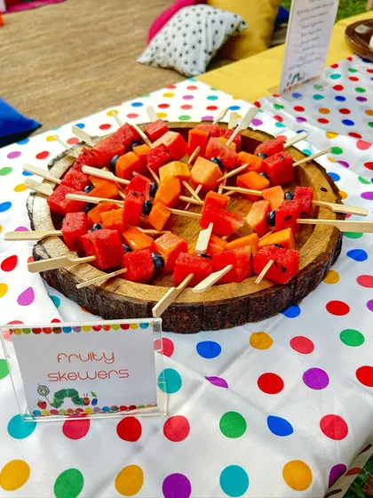 'Fruity Skewers' made with fresh watermelon, papaya, and blueberries. A simple, healthy, and colourful addition to any kids' party menu.