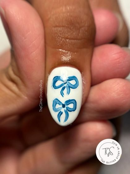 A cute and trendy design featuring two hand-painted blue bows with a subtle 3D effect, perfect for the coquette aesthetic.
