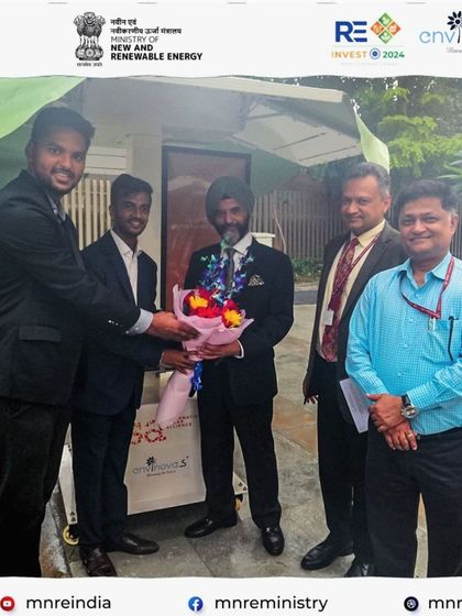 Our founders presenting a bouquet to Shri Bhupinder Bhalla, Secretary of MNRE, during the inauguration of our solar hut. This image, shared by the ministry itself, symbolizes our successful partnership with key government bodies.