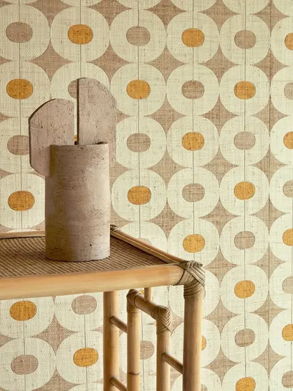 A close-up of our geometric raffia wallpaper paired with a sculptural vase. The raw, natural fibers converge with clean lines to create a space that feels both organic and architecturally sharp.