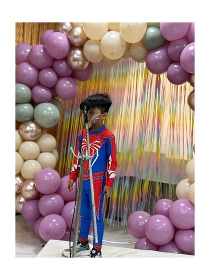 Our friendly neighborhood Spider-Man, focused and ready to perform.