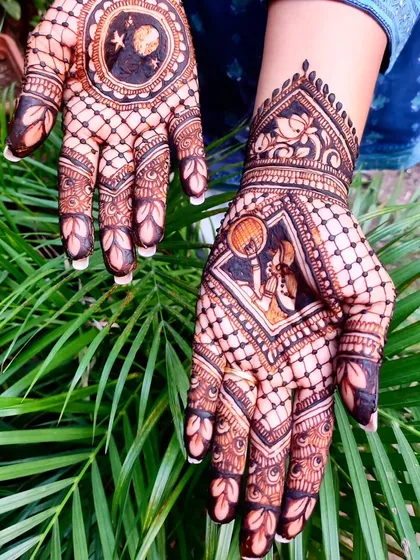 A closer look at the Karwa Chauth figurative work, showing the detail in the clothing and pose.
