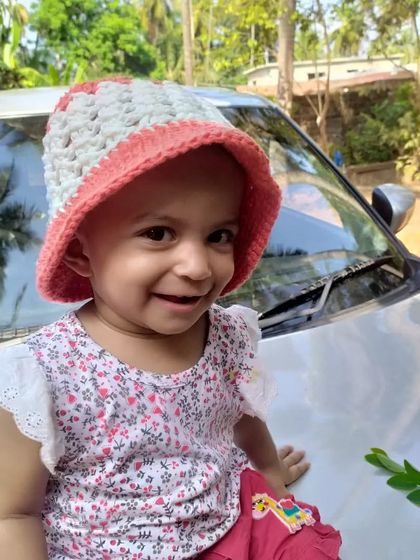 My daughter wearing the Bonnie Bell Sunhat. It’s made from cotton, so it’s breathable for sunny days, and the wide brim provides great shade.