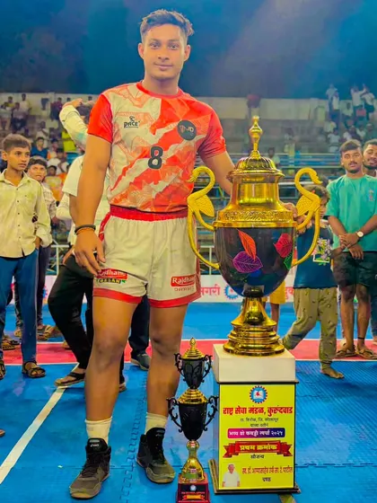 One of our players standing tall with the championship trophy after his selection for the Under-18 National Championship.