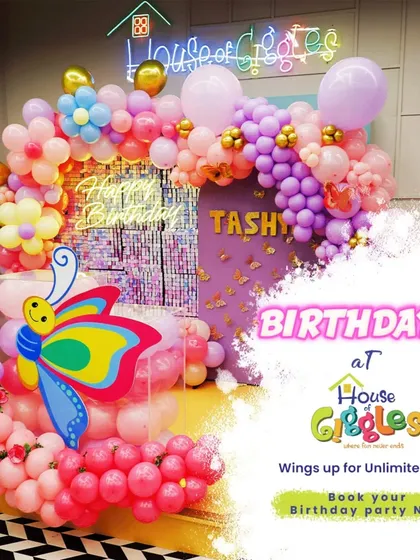 Let your party take flight with a beautiful butterfly theme. This setup features a stunning balloon arch in pastel colors with large, colorful butterfly accents, creating a whimsical and joyful backdrop for any celebration.