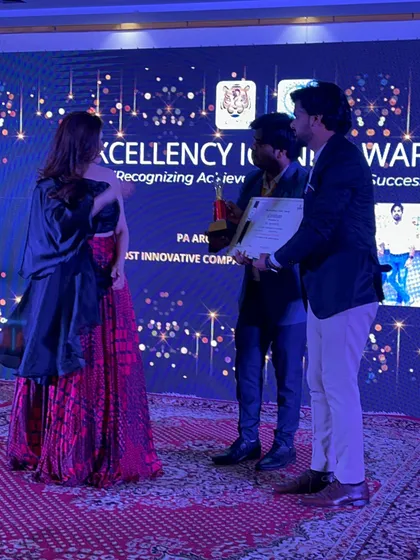 A candid shot from the award ceremony, highlighting the significance of the event.