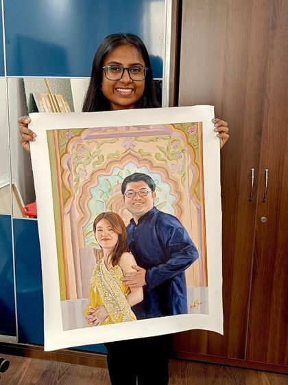 A happy moment with a finished couple's portrait, featuring a beautiful custom background.