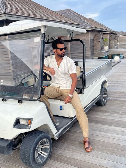 The resort wear ensemble is stylish enough for a ride around the resort, blending comfort with a polished look.