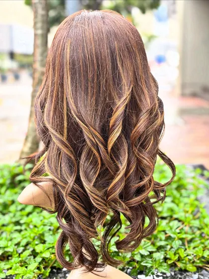 Our creamy blonde custom wig is another stunning option for a glamorous look. The color is rich and the waves are styled for a soft, romantic feel.