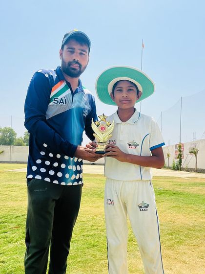 Dhruv Jangra receiving his Man of the Match award after taking a hat-trick.