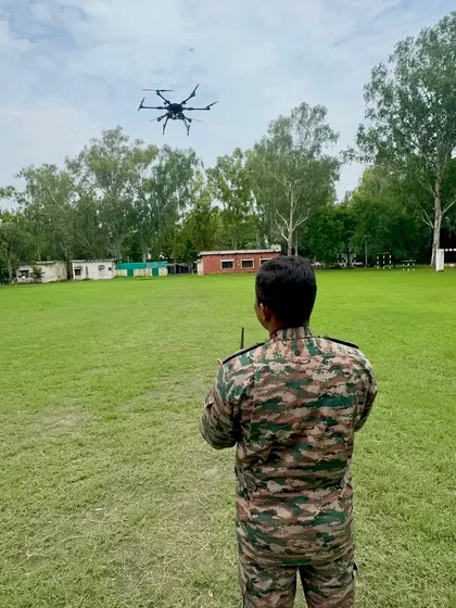 A soldier executes a training flight with a hexacopter in an open field. My program emphasizes flying in real-world conditions to prepare them for any operational environment.