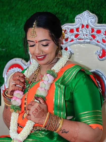 A sweet moment from the baby shower ceremony. The makeup is designed to be long-lasting and picture-perfect, even in candid shots.