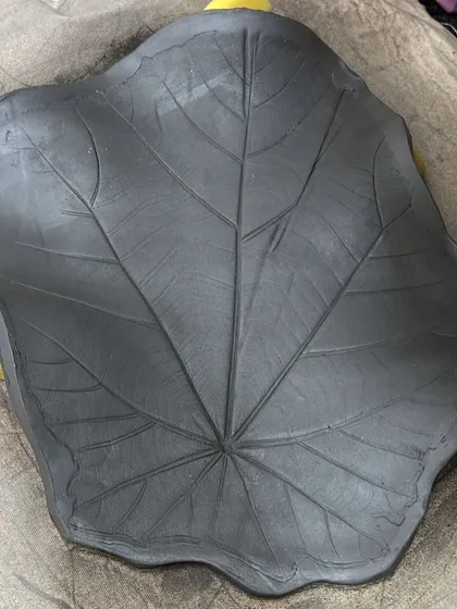 From forest floor to ceramic form. I found a large, beautiful leaf while traveling and carried it back to the studio to impress its form and memory into this clay platter.