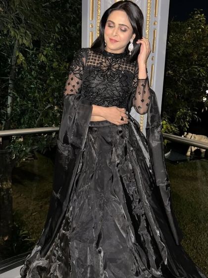 A duplicate of 167, an elegant shot of the black gown.