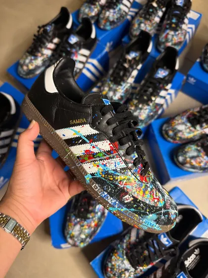 A close-up of one of nine hand-painted Adidas Sambas for a private corporate client. This abstract splatter design shows how I can execute a cohesive theme across a bulk order, perfect for unique corporate gifting.