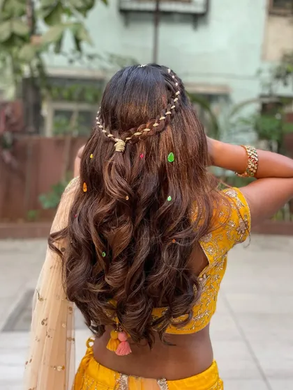 Another angle of the detailed gotta patti braid, a unique and traditional touch for a pre-wedding event.