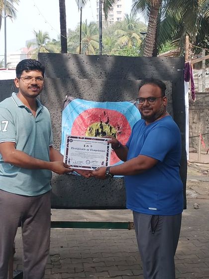 An adult student from the November batch receives his certificate. It's rewarding to see students of all ages achieve their goals.