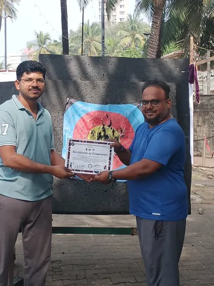 An adult student from the November batch receives his certificate. It's rewarding to see students of all ages achieve their goals.