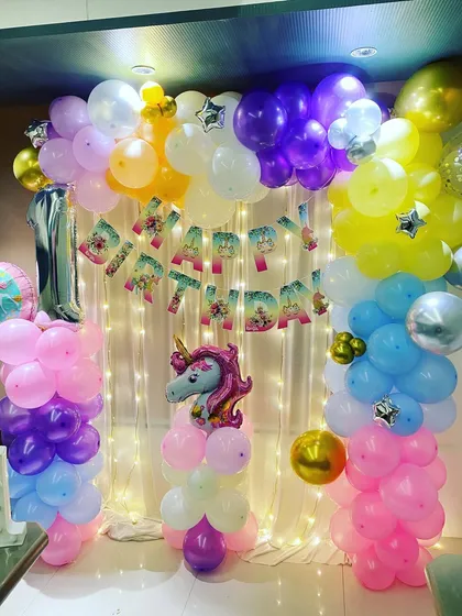 A clear view of the Unicorn-themed photo backdrop, perfect for capturing memories of a magical first birthday.