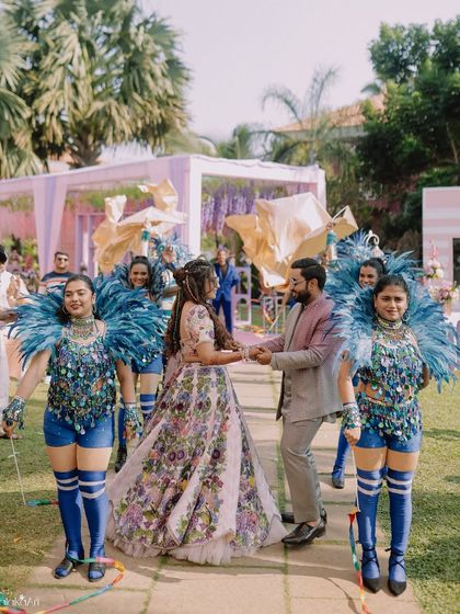 A fun and festive entry with carnival dancers. We capture all the unique elements that make your wedding celebrations special.