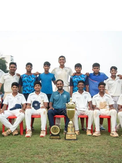 The team behind the champion. Advait Bhat with his teammates and the U-16 Payyade Trophy, celebrating his 'Best Bowler' award after taking 15 wickets in just 3 matches.