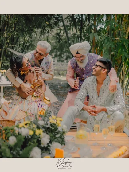 A candid moment of love and laughter with the family. These are the moments we live for, and having everyone styled beautifully makes the memories even more special.