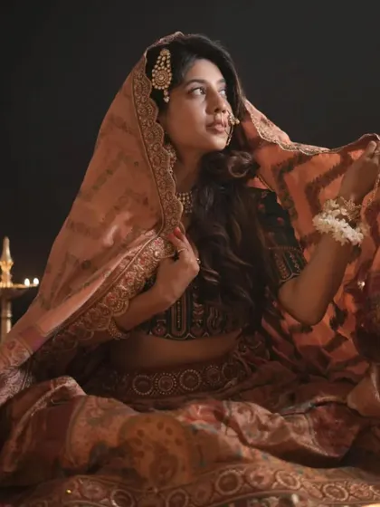 Another beautiful shot of our Heeramandi-inspired lehenga. The way the dupatta is draped adds a touch of old-world charm and elegance.